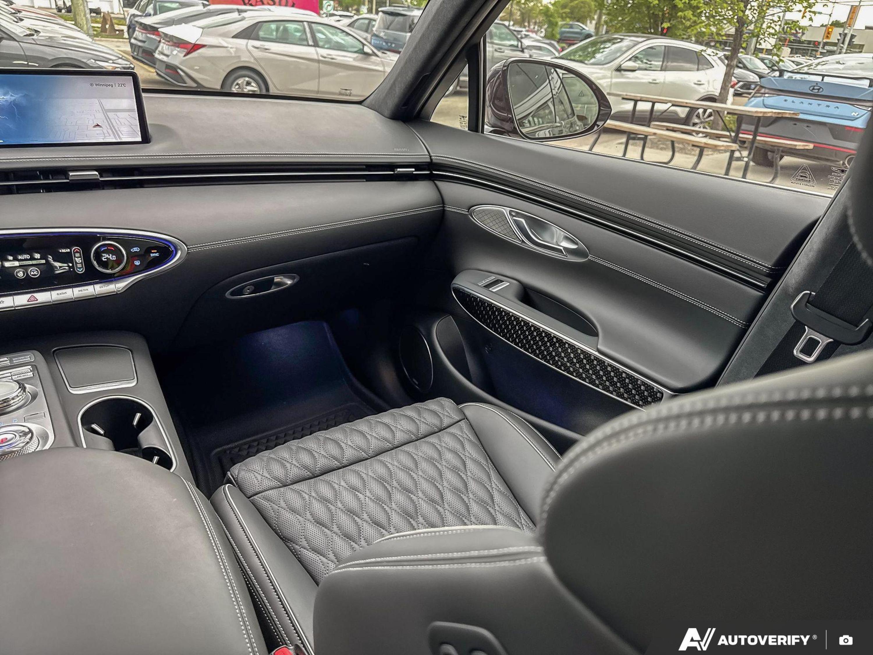 used 2023 Genesis GV70 car, priced at $52,990
